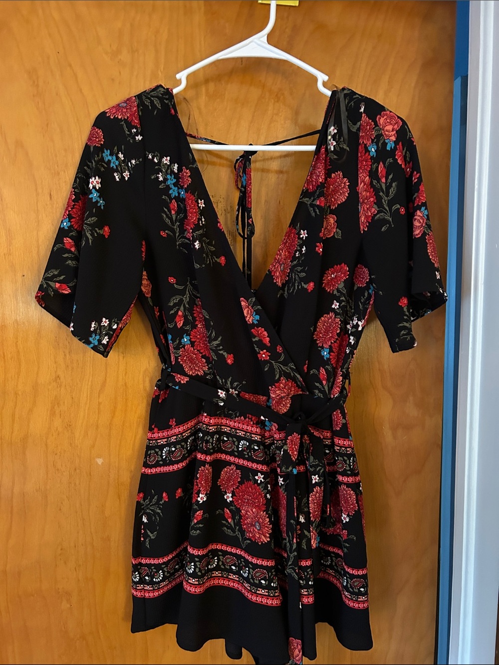 Black Floral Wrap Romper with Red Blooms